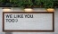 a sign on a tile wall that says, "We like you too"